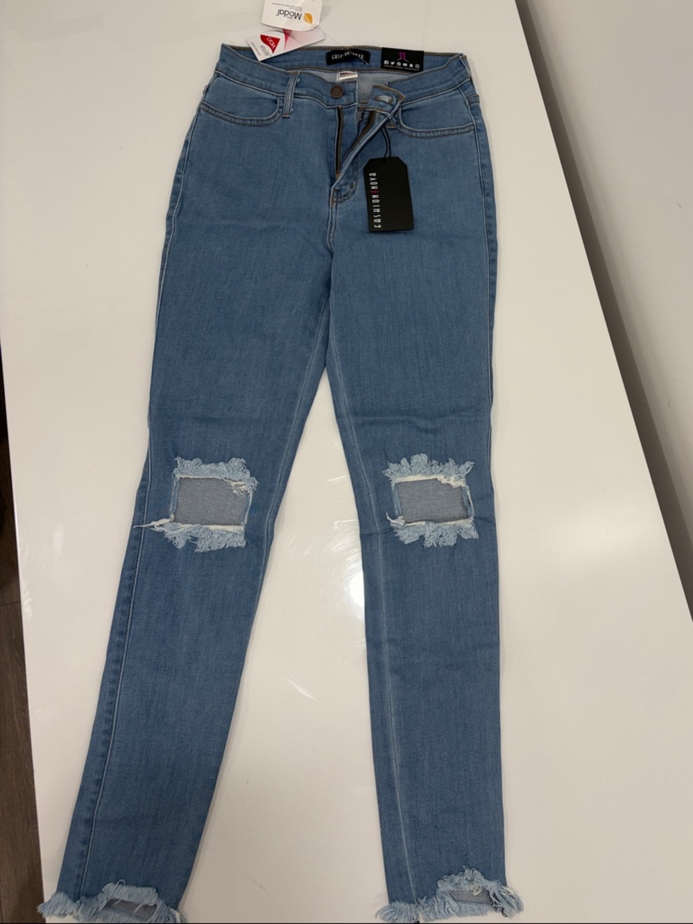 Fashion Nova Light Blue Ripped Skinny Jeans
